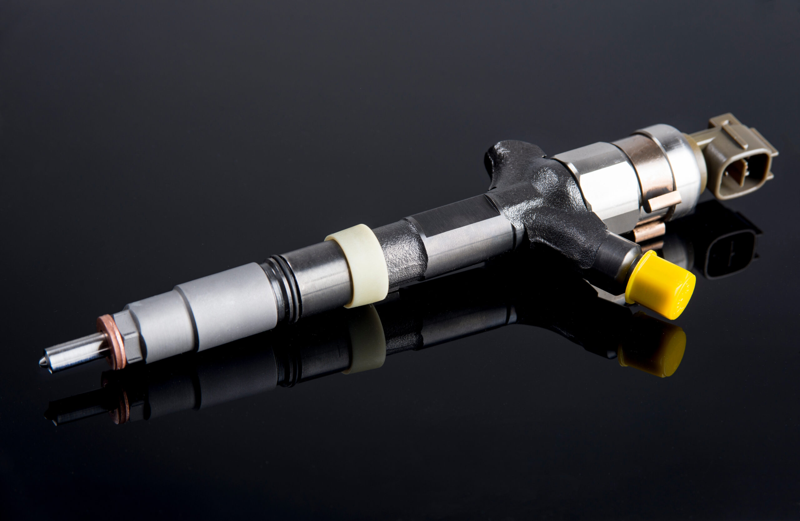 Image,Of,Diesel,Fuel,Injector,Isolated,On,Black Fuel Injector Replacement