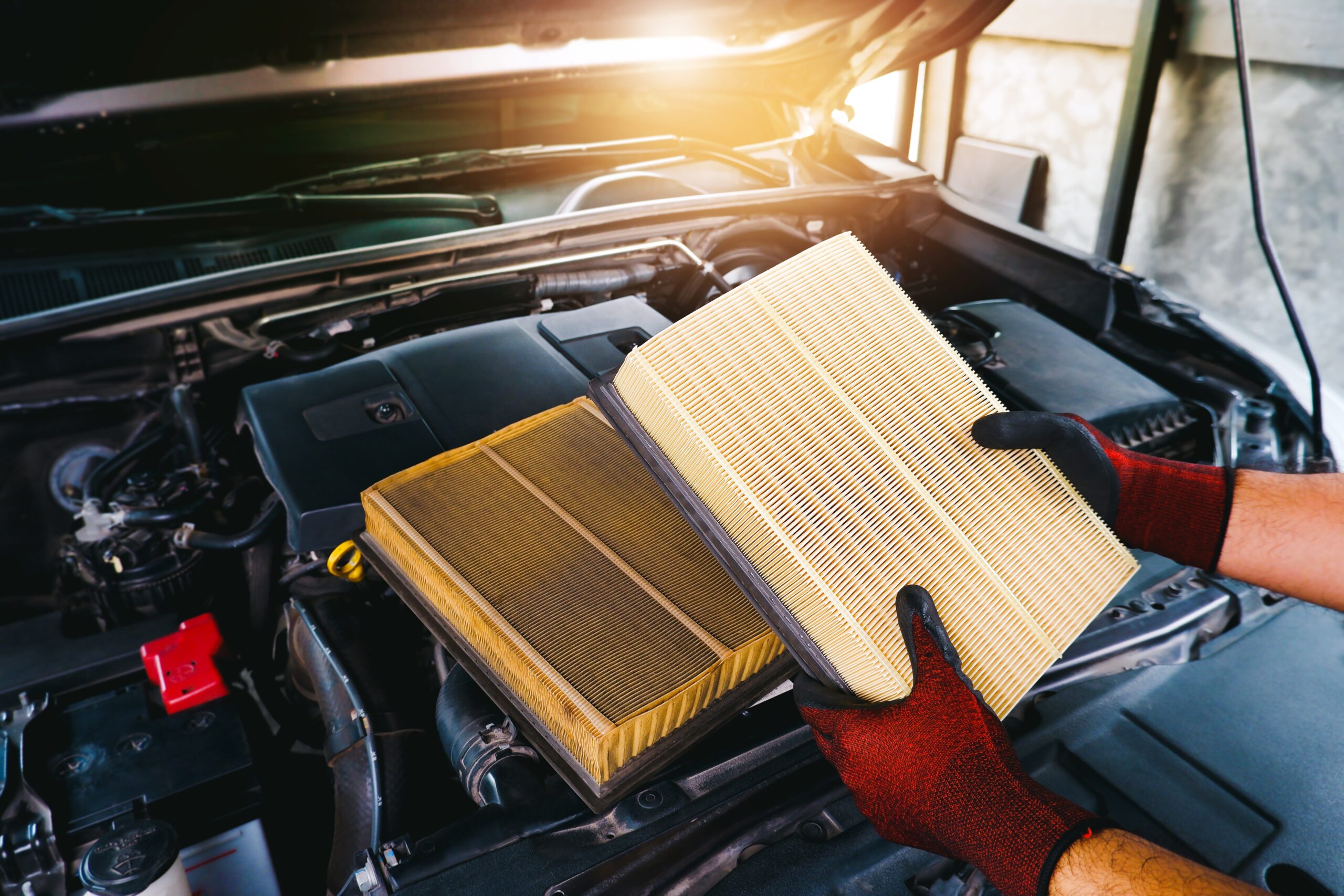 The,Mechanic,Holds,A,New,Car,Air,Filter,To,Replace Alternator Replacement on new engine
